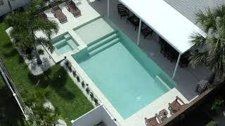 Large modern pool with spa and sun shelf - All Aqua Pools - New Smyrna Beach, Florida