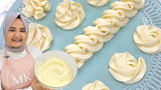 Velvety CREAM CHEESE BUTTERCREAM frosting that isn't too soft! Great for piping