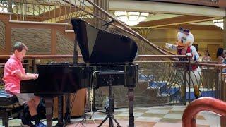 WOW! Daisy is Dazzled by child playing the piano aboard the Disney Dream! @LoganRichPiano