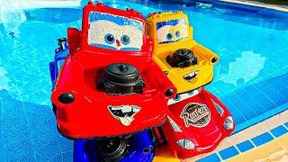 Disney Pixar Cars falling into deep pool, Lightning McQueen, Tow Mater, Mack, Sally, Francesco