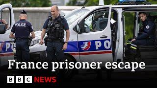 Manhunt under way in France after two prison officers killed in prisoner escape | BBC News