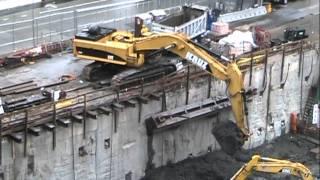 Cat 385CL Excavator loading lots of heavy mud