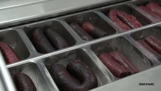 MULTIVAC thermoforming packaging machine R 105 packs sausages at Borrússia (Brazil)