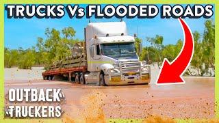 Trucks Drive Head-On Into Deep Flood Waters