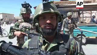 Afghan forces secure parts of Ghazni, residents clean rubble