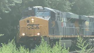 CSX 1982 ES44AH Seaboard System heritage unit leads CSX I032 through Manville NJ! 7/23/2023