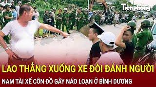 Bản tin thời sự: Lao thẳng xuống xe đòi đánh người,nam tài xế côn đồ gây náo loạn ở Bình Dương