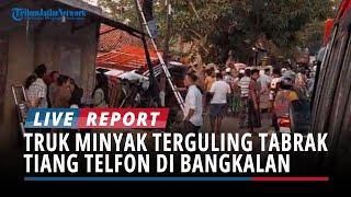 Truk Bermuatan Minyak Goreng Terguling Tabrak Tiang Telepon Hingga Menimpa Warung di Bangkalan