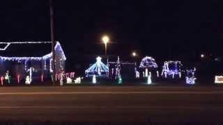 2014 Christmas light show. Here is four songs I did to 32 channel light o Rama . 10,000 lights