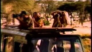 Visa - "How do you stop a rhino from charging?" (Commercial - 1997)