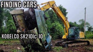 Dragging out cars First job with my Kobelco SK210lc-10