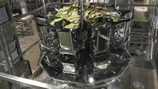 Ohlson ROFS Rotary Pouch System with Multi-Head Weigher Packaging Multi-Grain Chips | ProPac.com