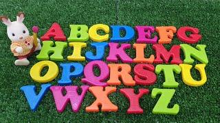 English capital letters while listening to Sylvanian and exciting musical alphabets-Toy yam