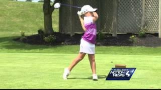 Second-grader at head of class on the links