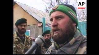 Chechnya-Komsomolskoye Recovering From Bombardment