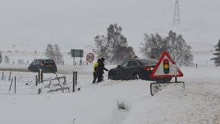 Driving Through  a Snow Storm in the Scottish Highlands (Scotland)