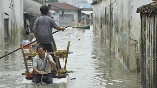 Deaths and destruction as floods ravage southern China