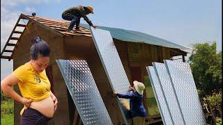 Put a sturdy corrugated iron roof on the Wooden house, preparing to welcome new members