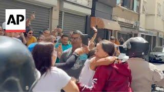 Venezuela opposition leader Maria Corina Machado rides through Caracas to greet voters