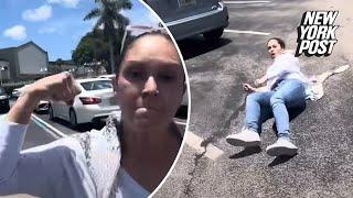 Enraged Florida woman goes ballistic in parking lot, swings at YouTuber and is knocked to the ground