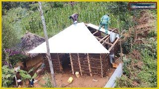 Tears of Joy roll down as we roof the house of a struggling family in Nyamira