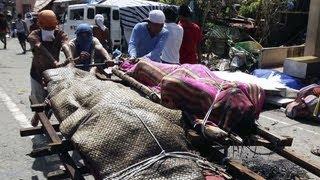 Typhoon Haiyan aftermath: 10,000 feared dead in Philippines