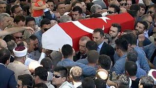 Recep Tayyip Erdogan helps carry coffin of Turkey coup victim