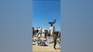 Syrians in Aleppo topple statue, as rebels control city  | VOA News