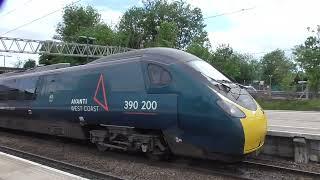 Stafford Railway Station 221113 XC departs P4+390200 (390020) AWC arrives on P5 on 25th May 2025