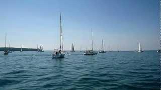 Wakeboarding behind a sailboat