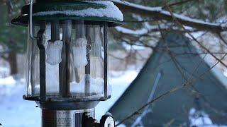 Winter camping. Snow and wind. Two survival items: Coleman Gasoline Lantern 220K, Coleman Stove 502