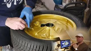 Porsche Felge in gold/matt mit Sprühfolie zur Probe lackieren.Paint the Porsche rim with spray film.