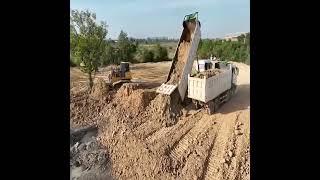 Bulldozer Clearing Land & Trees next to the Swamp