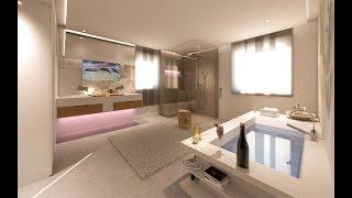 Badezimmer mit Wandtapete und TV im Spiegel Design by Torsten Mueller aus Bad Honnef Koeln Bonn