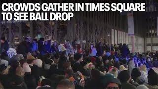 Crowds gather in Times Square to see ball drop