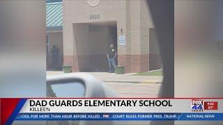 Dad Guards Elementary School