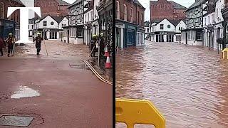 Storm Bert: Moment town's flood wall collapses