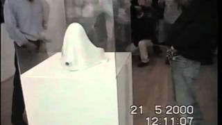Two artists piss on Duchamp's urinal