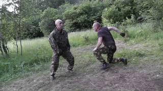 Встречный удар ногой с добиванием локтем.В.Н.Крючков/Counter kick with finishing with an elbow.