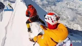 EVEREST, TWO PEOPLE SLIP OFF A CLIFF IN TOTAL SILENCE.