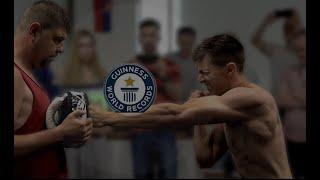 Guinness world record holder Pavel Trusov   On the 16” Bull Doza Fight Wear Water Punch Bag