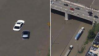 Major highway under water, cars stranded | Toronto's flooded Don Valley Parkway