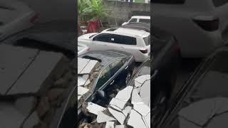 Nigerian Car Dealer In Tears After A Fence Collapsed On 6 Vehicles