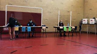 Voters visit polling place despite virus fears