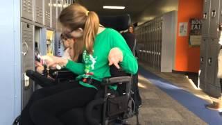 Watch six-grader with cerebral palsy open redesigned locker