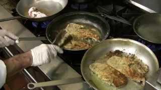 Chef prepares livers and onions