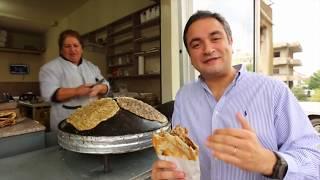 Delicious Lebanese Breakfast: "Flatbread SAJ Manakish". Traditional Village Food