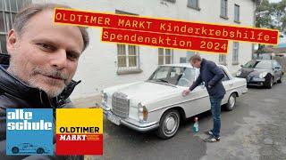 OLDTIMER MARKT Kinderkrebshilfe-Spendenaktion 2024 - Gregor Schulz zeigt die Fahrzeuge im Lostopf