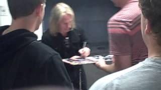 Robert Mason of Warrant signing autographs