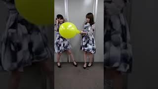 Asians Inflating Balloon Until Pop